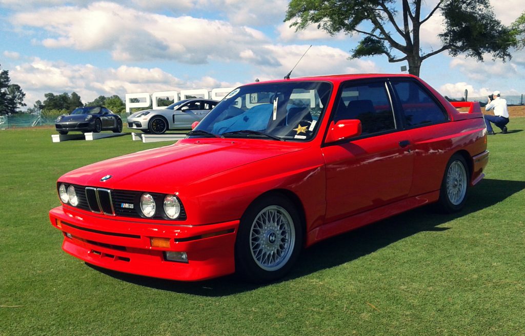 A Torch Red 1986 BMW E30 M3 staged for Saturday’s Concours.